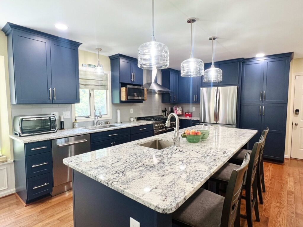 Kitchen remodel with blue cabinets and granite counter tops Maryland